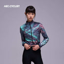 Women's WINTER thermal Jersey with long sleeves in blue-purple tie-dye pattern, high collar, and front zipper closure with logo on sleeve.