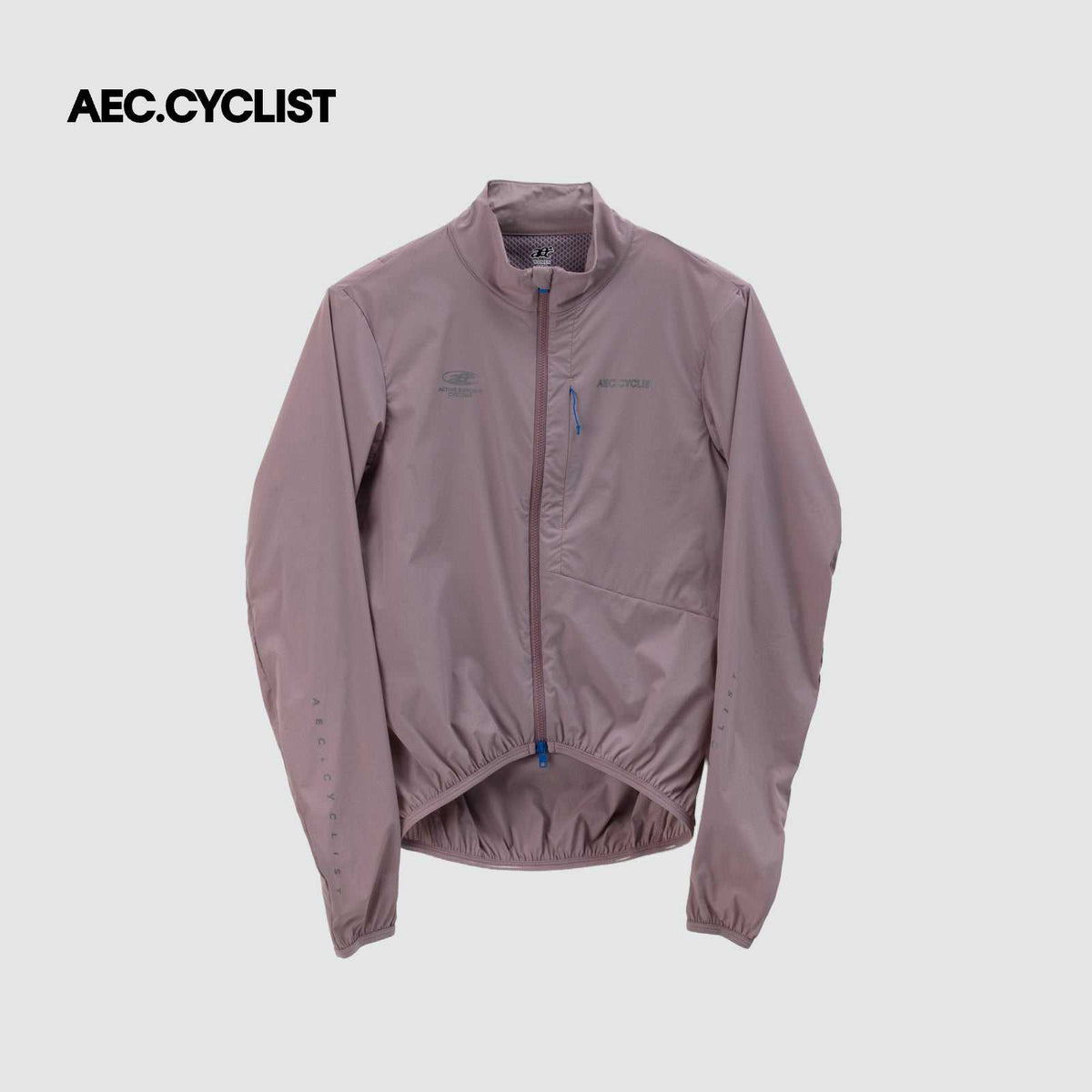 Men's WINTER thermal Jersey windbreaker in muted purple, lightweight windproof fabric with zippered front and rear pockets, reflective details.