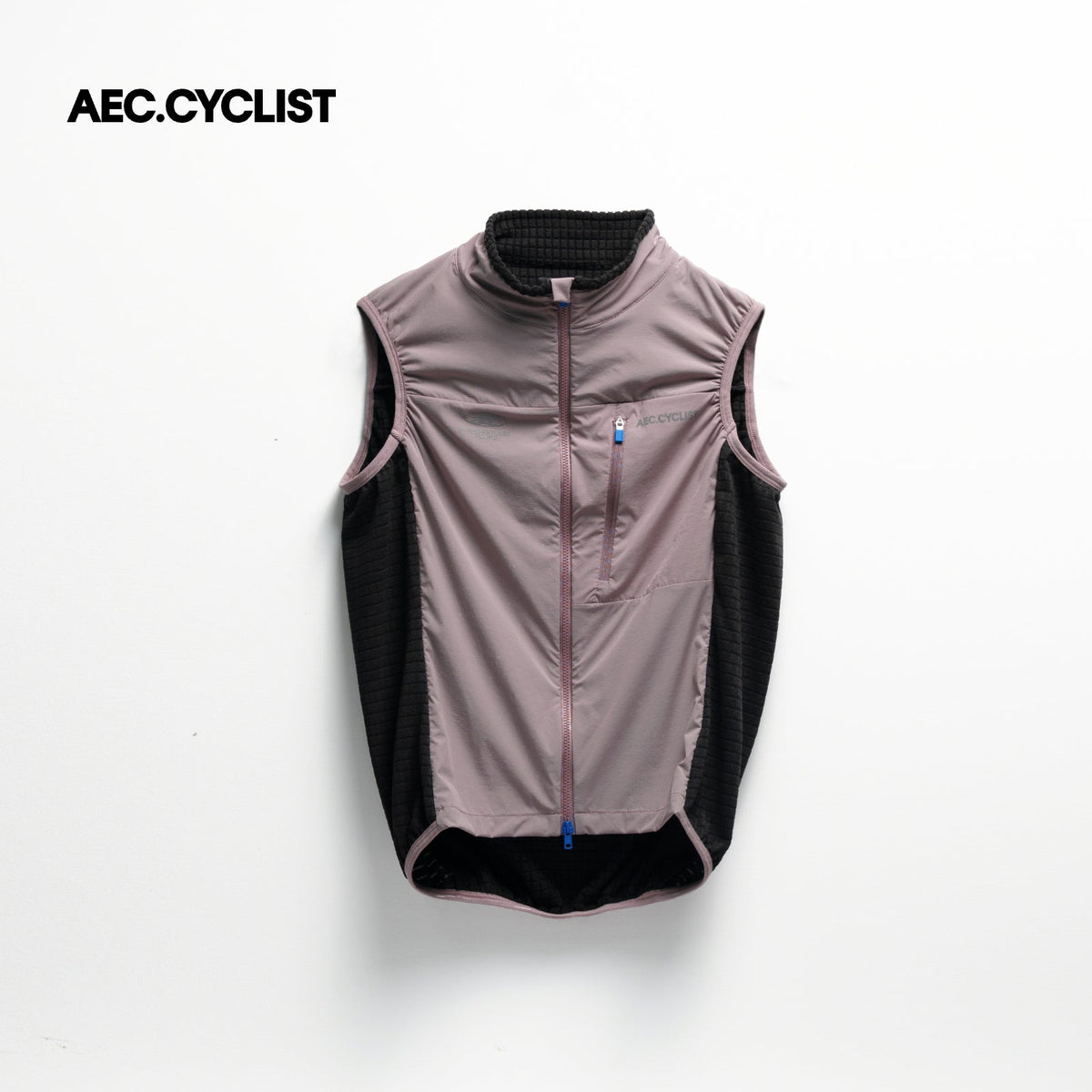 Men's WINTER thermal Jersey sleeveless cycling gilet in purple and black with front zipper and chest pocket detailing.